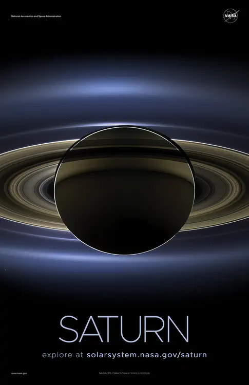 In July 2013, in an event celebrated the world over, NASA's Cassini spacecraft slipped into Saturn's shadow and [turned to image the planet](https://solarsystem.nasa.gov/resources/185/the-day-the-earth-smiled/), seven of its moons, its inner rings &mdash;and, in the background, our home planet, Earth (blue dot at lower left). Credit: NASA/JPL-Caltech/Space Science Institute ⬇️ High resolution PDF [here](https://solarsystem.nasa.gov/system/downloadable_items/1587_Saturn_B_PDF.zip)