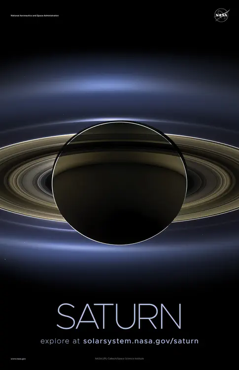 In July 2013, in an event celebrated the world over, NASA's Cassini spacecraft slipped into Saturn's shadow and [turned to image the planet](https://solarsystem.nasa.gov/resources/185/the-day-the-earth-smiled/), seven of its moons, its inner rings —and, in the background, our home planet, Earth (blue dot at lower left). Credit: NASA/JPL-Caltech/Space Science Institute ⬇️ High resolution PDF [here](https://solarsystem.nasa.gov/system/downloadable_items/1587_Saturn_B_PDF.zip)